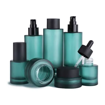 Frosted teal cosmetic bottle and jar sets (toner, lotion, serum)