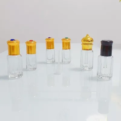Glass perfume roller bottles in 3 ml, 6 ml, 9 ml, and 12 ml sizes with screw caps