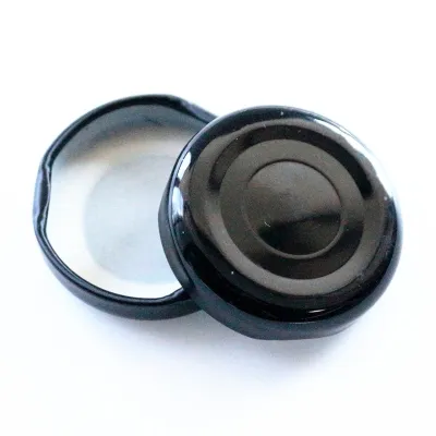 Black metal plastisol-lined lug caps