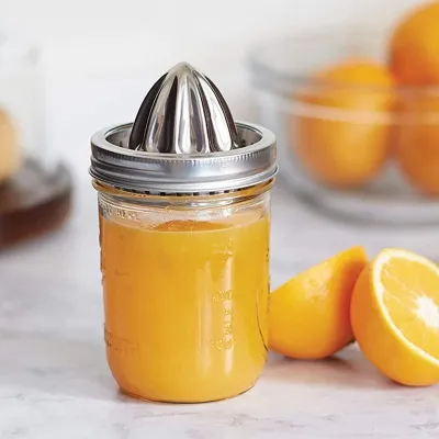 Stainless steel juicing lids for wide-mouth Mason jars
