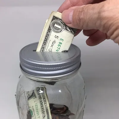 Coin slot bank lid inserts for Mason jars