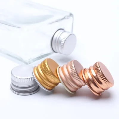 Aluminum screw caps (hand-applied)